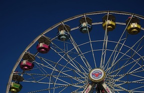 Look up at the colorful ferris wheel at the Austin Rodeo Fair.